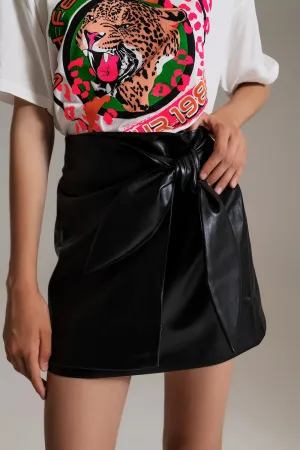 BLACK FAUX LEATHER MINI SKIRT WITH BOW