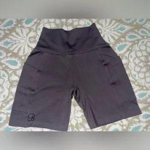 Bombshell Sportswear Pocket Biker Shorts in Gray