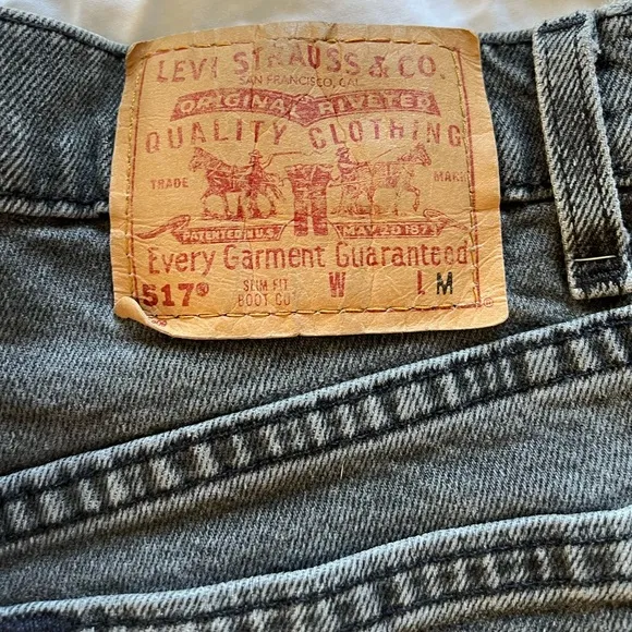 Levi’s high waisted black / gray jean shorts