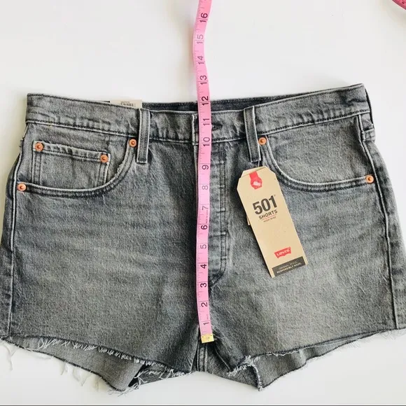 NWT Levi’s 501 High Waisted distressed shorts - 31