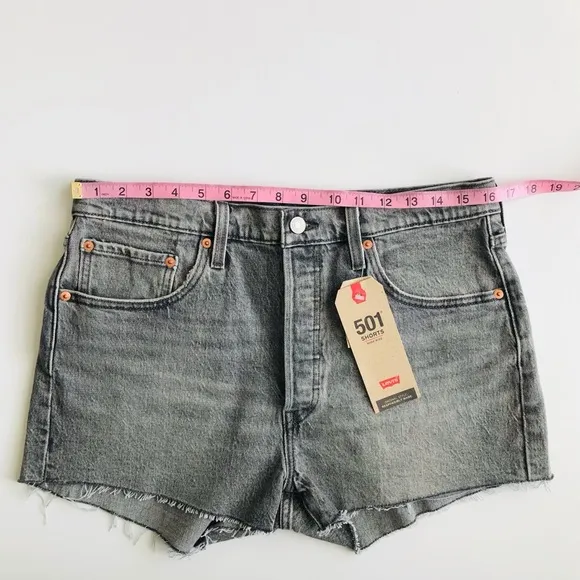 NWT Levi’s 501 High Waisted distressed shorts - 31