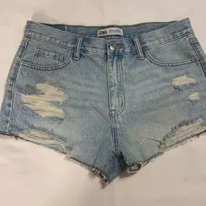 Zara Size 12 distressed high waisted denim shorts